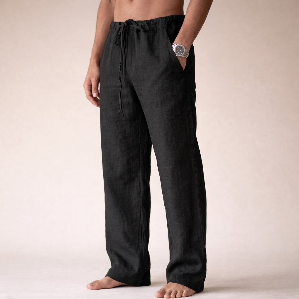 Men's black linen drawstring pants with a relaxed straight-leg fit, elastic waistband, and breathable fabric.