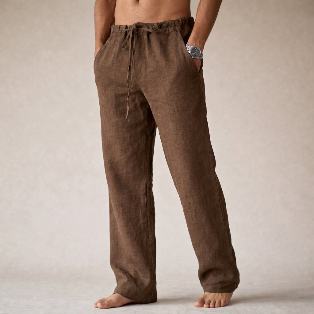 Men's brown linen drawstring pants with a relaxed straight-leg silhouette and breathable linen construction.