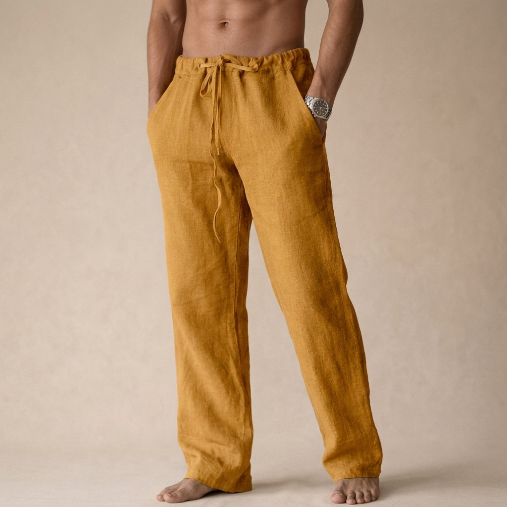Men's mustard yellow linen drawstring pants with an elastic waistband, relaxed fit, and lightweight breathable fabric.