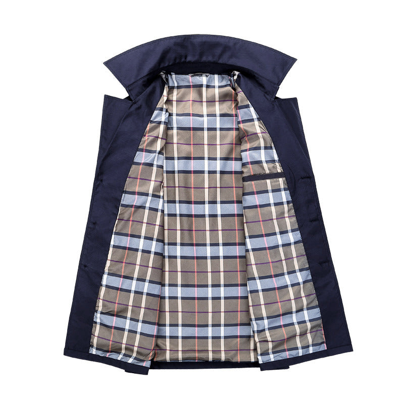 Navy blue double-breasted trench coat with a structured collar and interior checked lining on a white background.