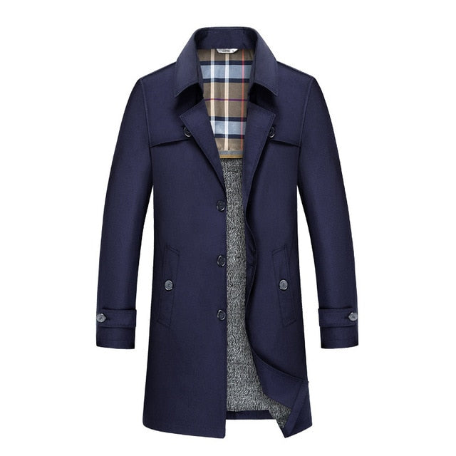 Navy blue double-breasted trench coat with a structured lapel, button-front closure, and classic checked interior lining.
