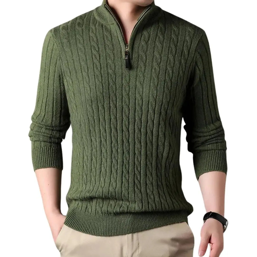 Olive green cable knit quarter-zip sweater with a ribbed mock neck and tailored fit, worn with neutral chinos.