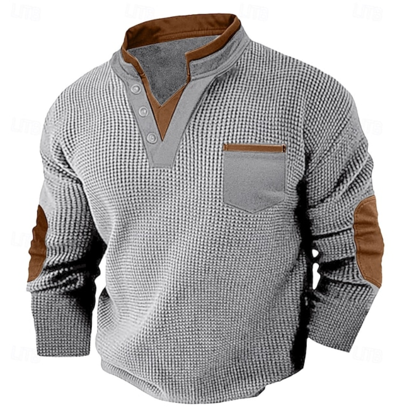 Men's light gray waffle knit Henley sweater with a stand collar, contrast trim, chest pocket, elbow patches, and long sleeves.