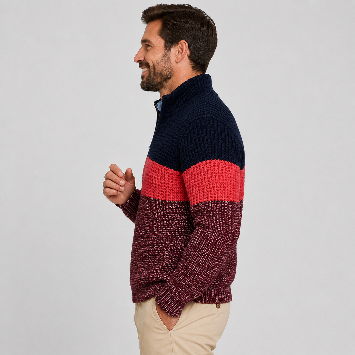 Chunky knit quarter-zip sweater with navy, red, and burgundy colorblock stripes and a ribbed stand collar.