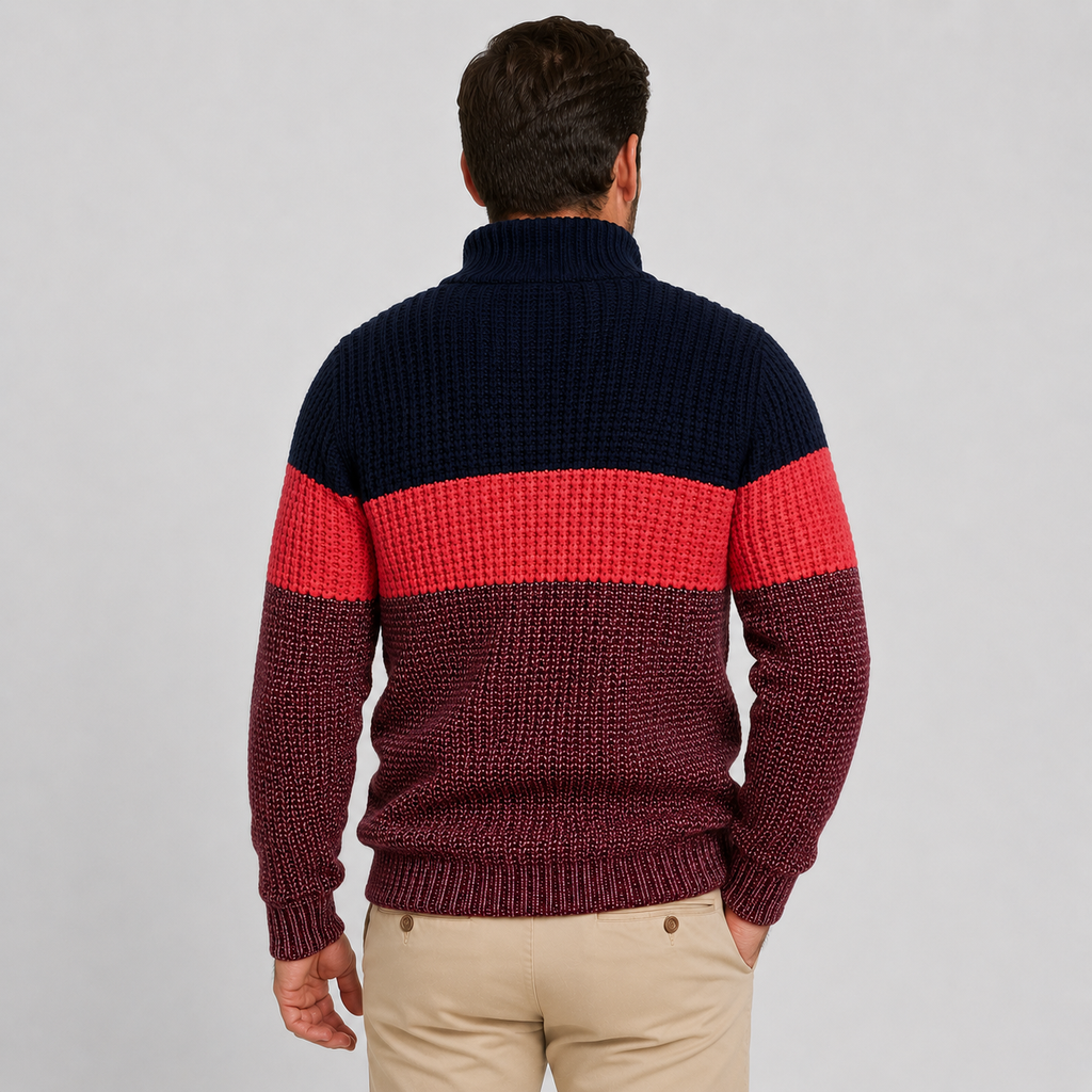 Chunky knit quarter-zip sweater with navy, red, and burgundy colorblock stripes and a ribbed stand collar.