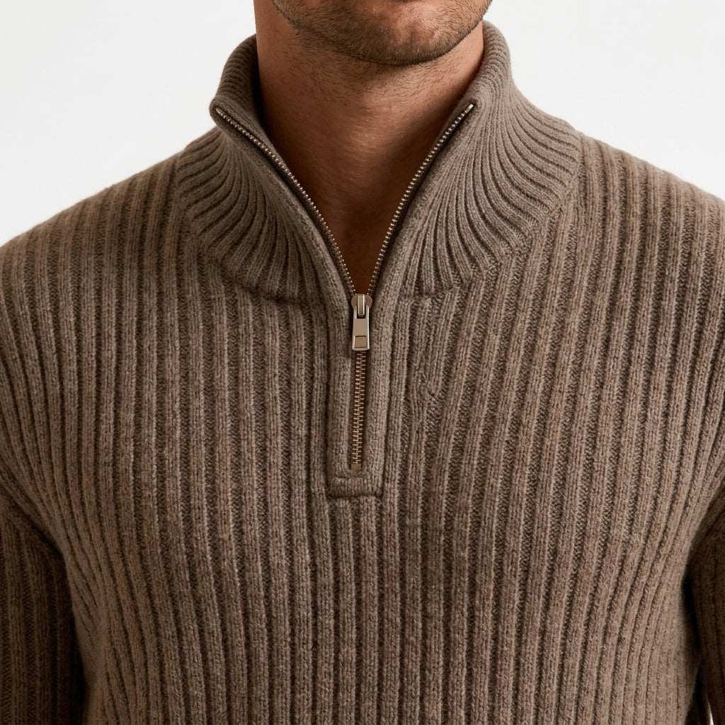 Taupe chunky ribbed quarter-zip sweater in heavyweight knit with a high stand collar and metal zipper detail.