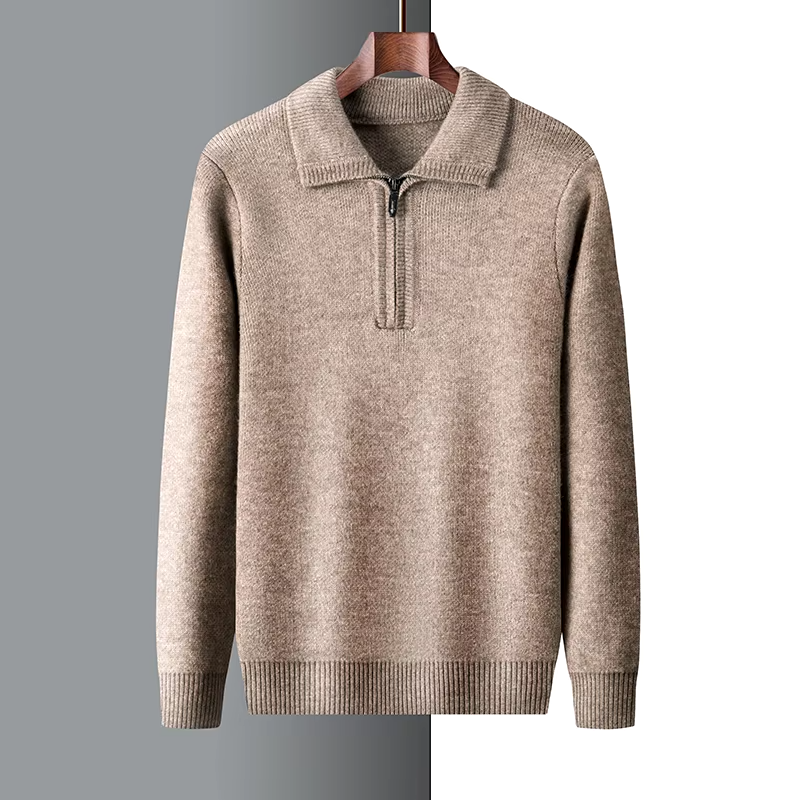 Tan marled mid-weight knit quarter-zip sweater with a ribbed polo collar, cuffs, and hem hanging on a wooden hanger.