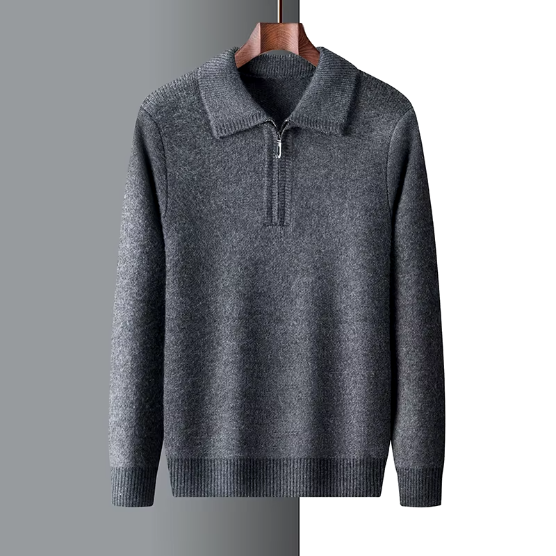 Charcoal marled knit quarter-zip sweater with a ribbed polo collar, cuffs, and hem hanging on a wooden hanger.