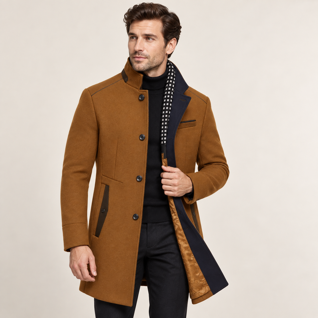 Brown wool overcoat with a raised collar, single-breasted button front, and contrasting navy colorblock interior panels.