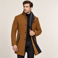 Brown wool overcoat with a raised collar, single-breasted button front, and contrasting navy colorblock interior panels.