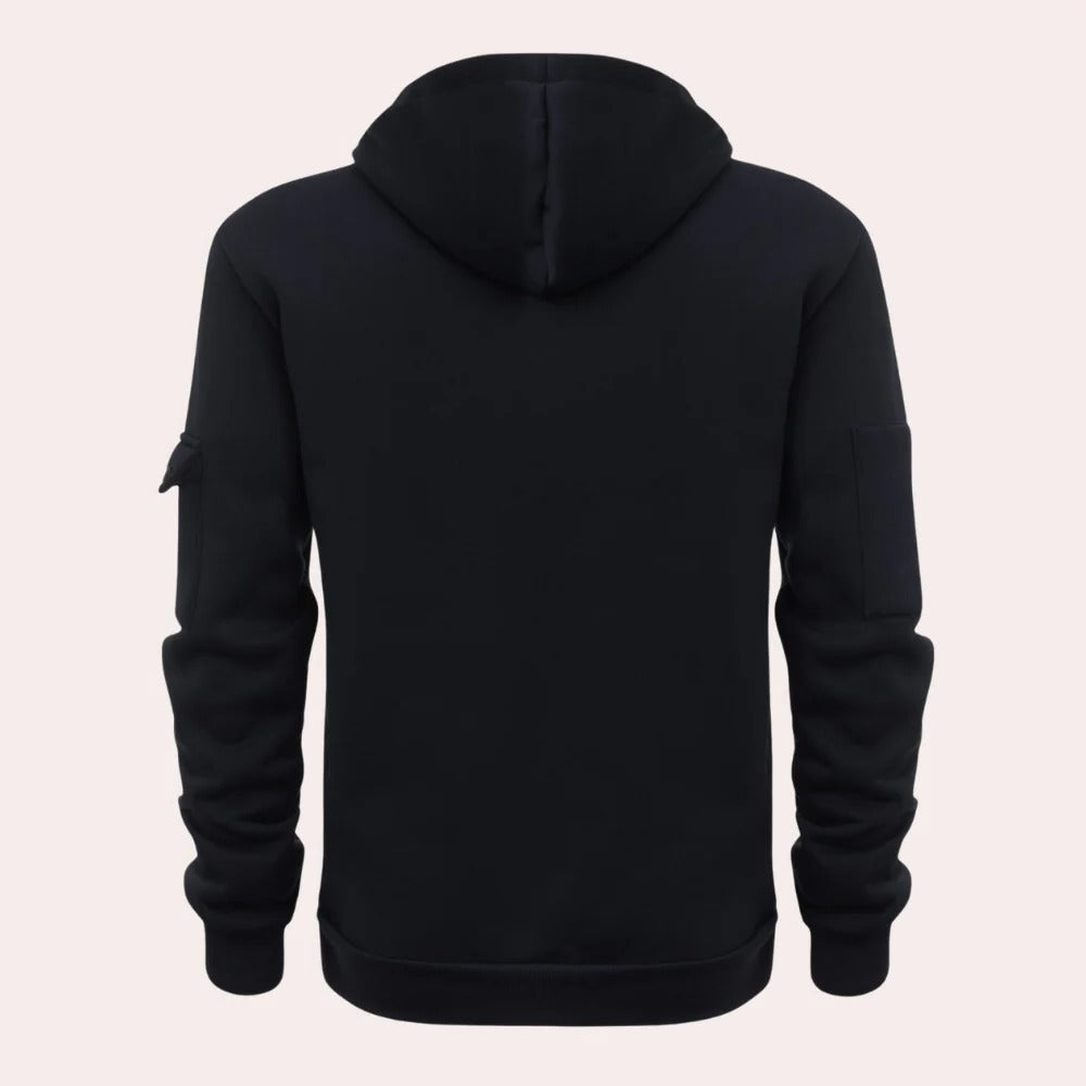 Back view of a black tactical pullover hoodie with an adjustable hood, long sleeves, and relaxed fit.