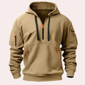 Khaki tactical pullover hoodie with an adjustable hood, half-zip neckline, sleeve zip pocket, kangaroo pocket, and contrast zipper accents displayed on a white background.