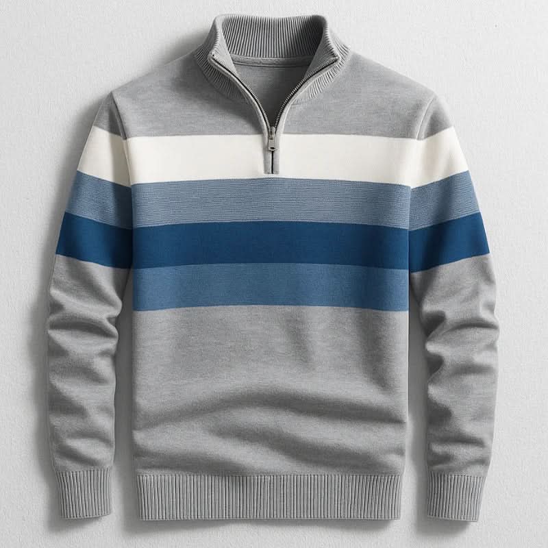 Gray midweight cotton quarter-zip sweater featuring a bold white and blue colorblock chest stripe and ribbed trim.
