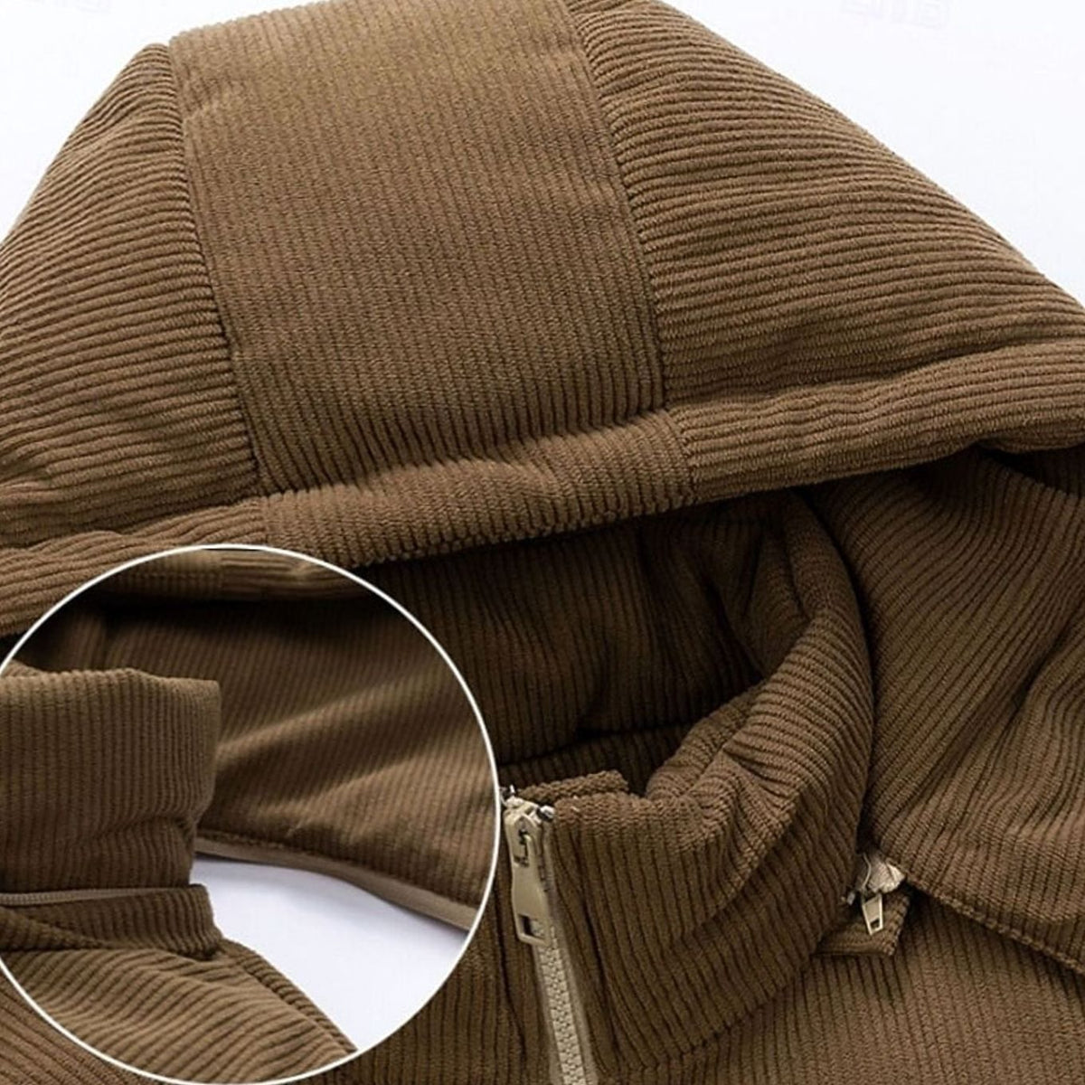 Close-up of a brown and cream hooded puffer jacket showing the corduroy-trim hood and collar