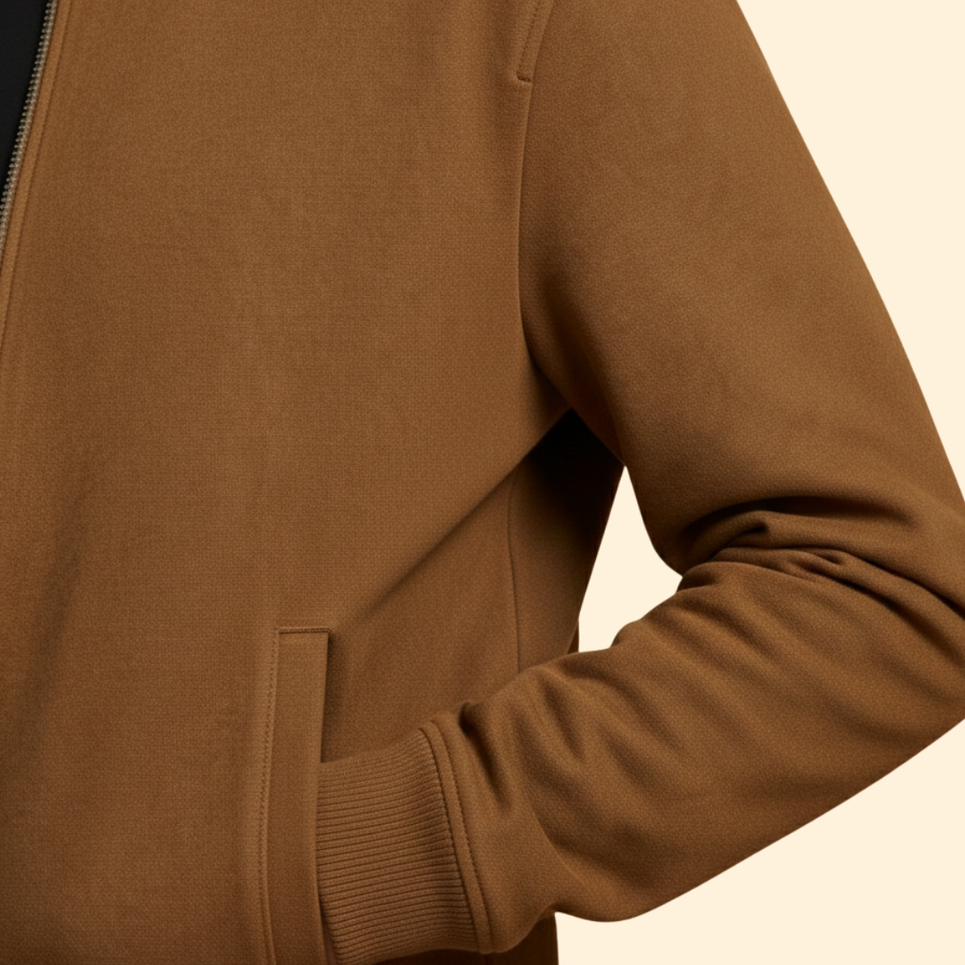 Brown bomber jacket in brushed woven fabric with a side entry pocket and ribbed cuff detail.