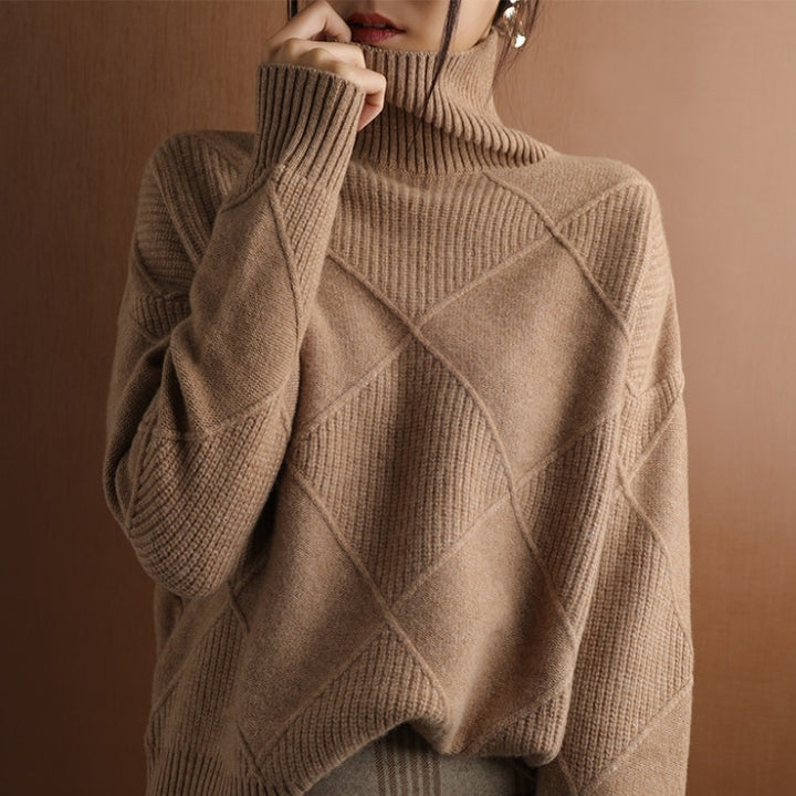 Woman wearing a brown 
ribbed turtleneck sweater featuring a textured knit pattern and oversized fit.