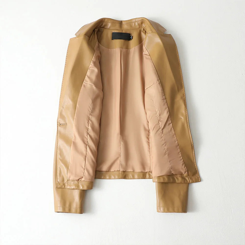 Interior lining detail of the camel lambskin leather blazer, laid open flat to show the smooth inner finish and cuffs