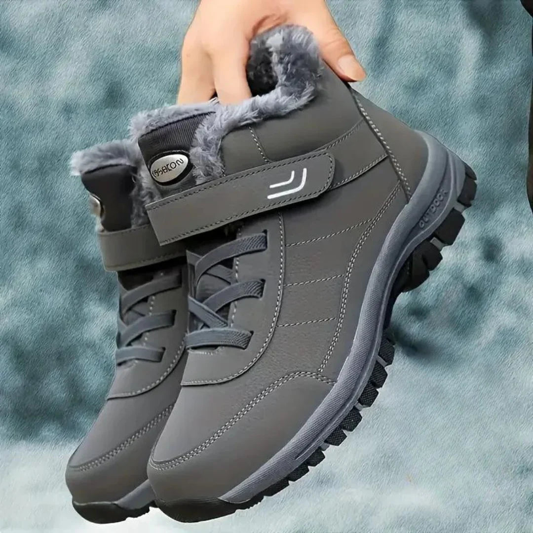 Gray fleece-lined ankle boots for men with lace-up closure, buckle strap, and rugged anti-slip sole