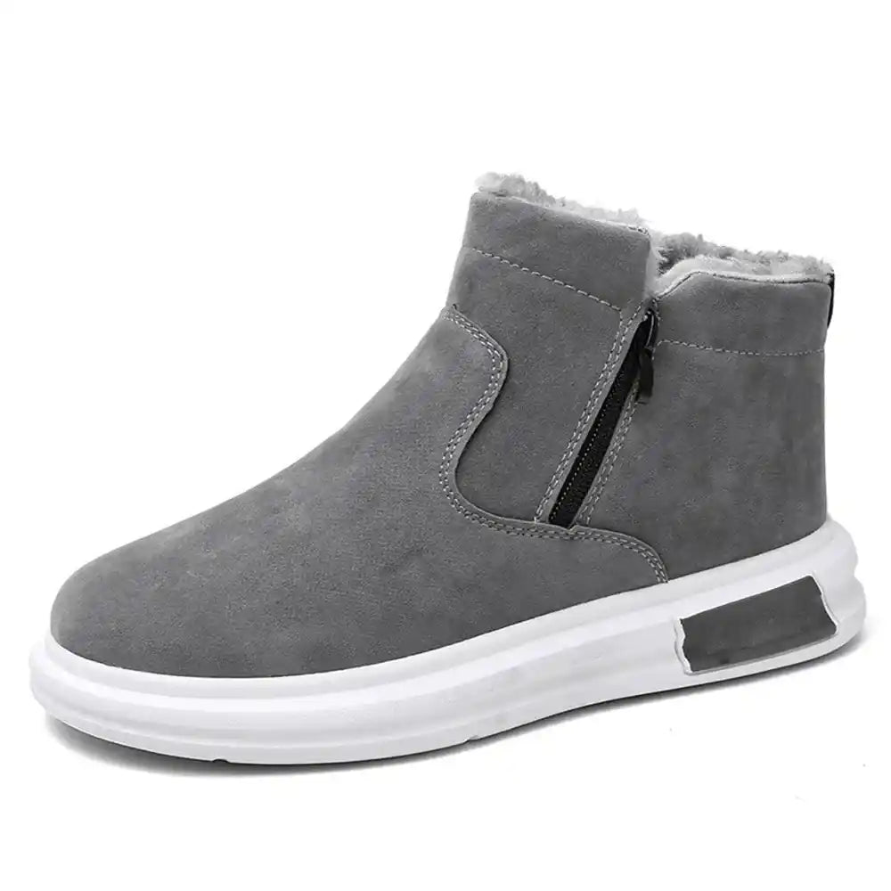 Gray fur-lined winter boots for men with a wide toe box, side zip, soft fleece lining, and white sole