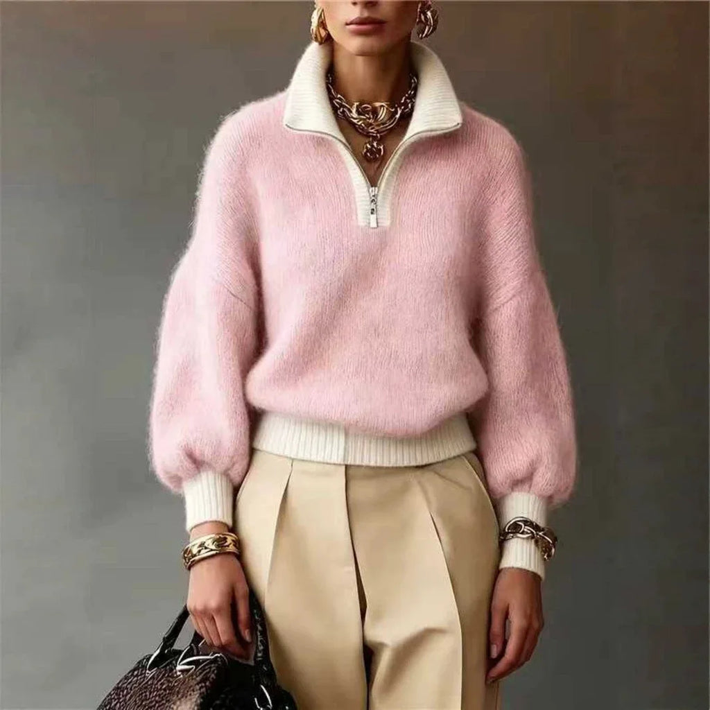 Fuzzy pink knit quarter-zip sweater with white contrast ribbed trim and voluminous balloon sleeves.