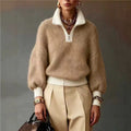 Tan fuzzy knit quarter-zip sweater with cream contrast ribbing, balloon sleeves, and a relaxed, soft-textured silhouette.