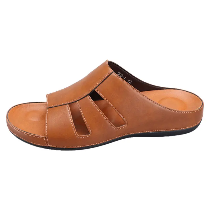 Side profile product shot of a tan leather slip-on sandal on a plain white background, showing the cutout straps and full silhouette.