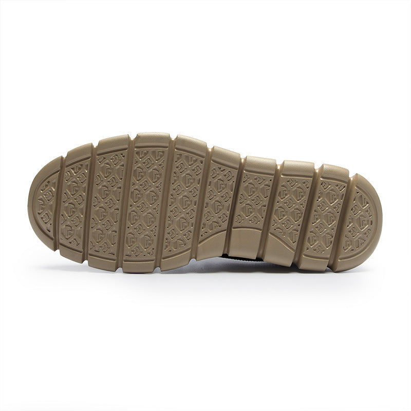 Bottom view of a sneaker's tan rubber outsole showing the segmented tread pattern, on a plain white background.