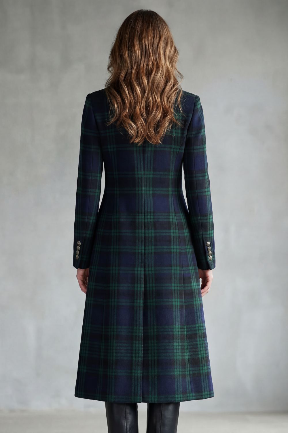 Longline wool-blend coat in a dark green and navy Highland check with a tailored silhouette and buttoned cuffs.