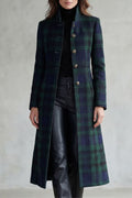 Tailored longline wool-blend coat in a dark green and navy Highland check with a structured button-front silhouette.
