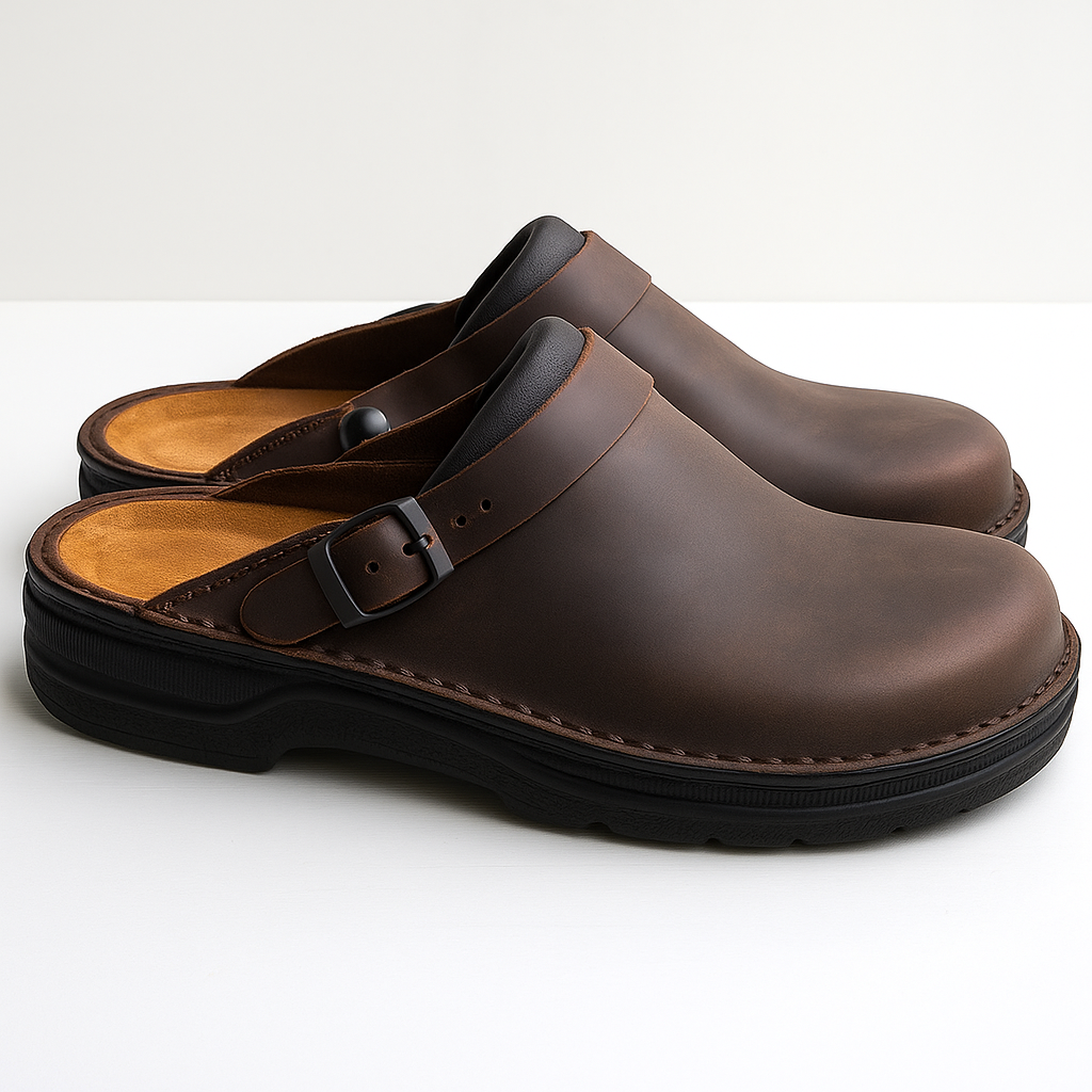 Pair of dark brown leather slip-on clogs with adjustable buckle straps, cushioned footbeds, and sturdy black outsoles displayed on a white background.