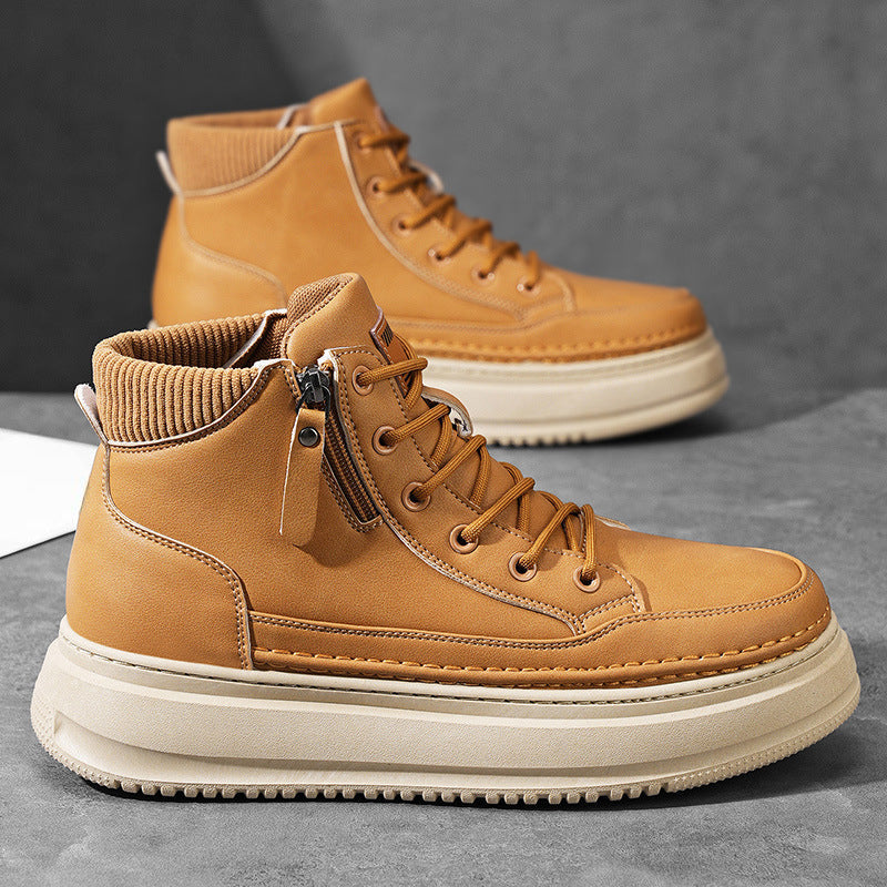 Pair of tan leather Hudson high-top sneakers with side zipper and cream platform sole