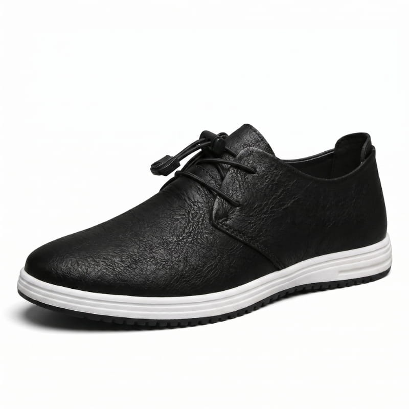 Side profile of a black leather lace-up sneaker with white sole on a plain white background
