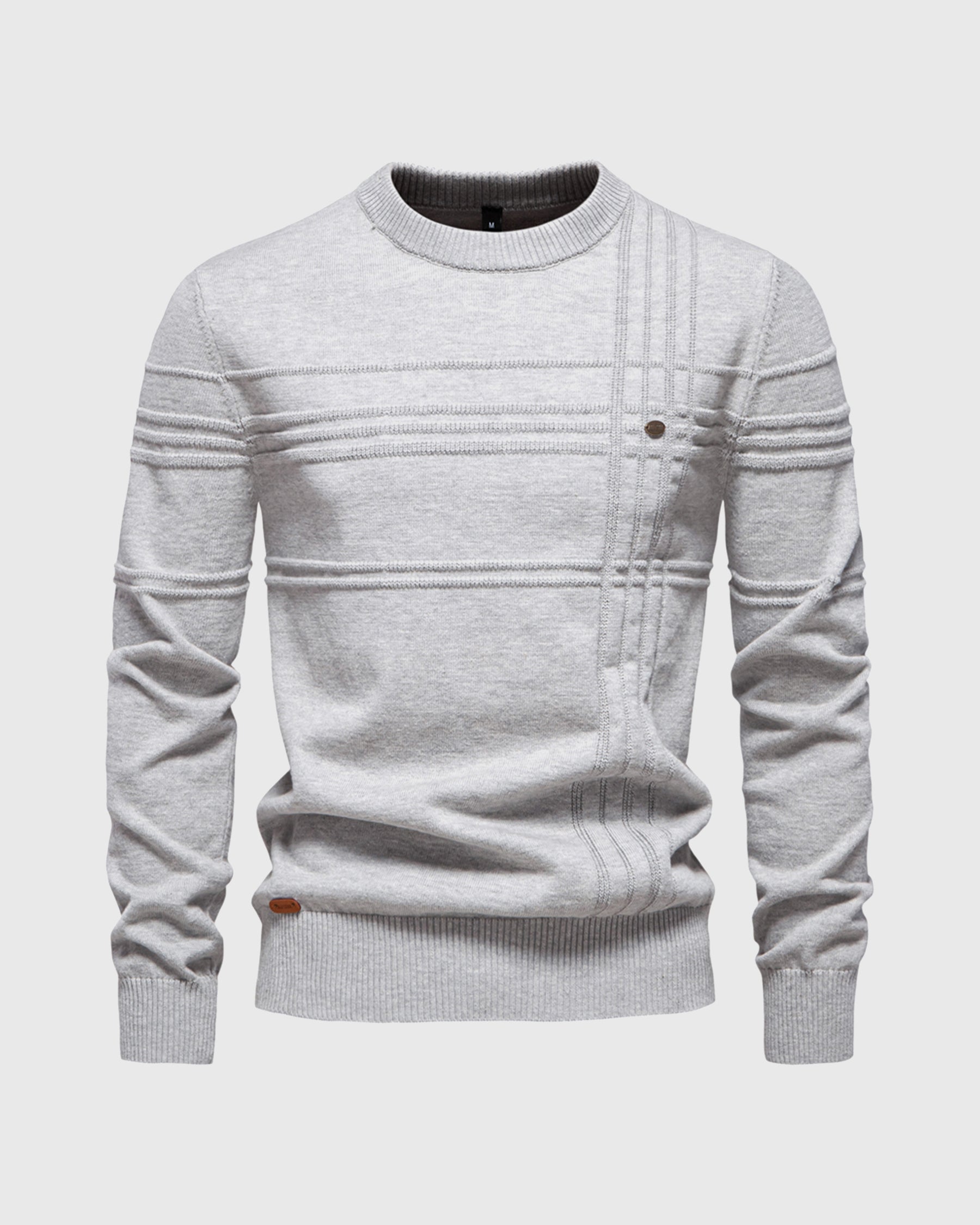 Flat lay of light grey ribbed knit sweater with crew neckline
