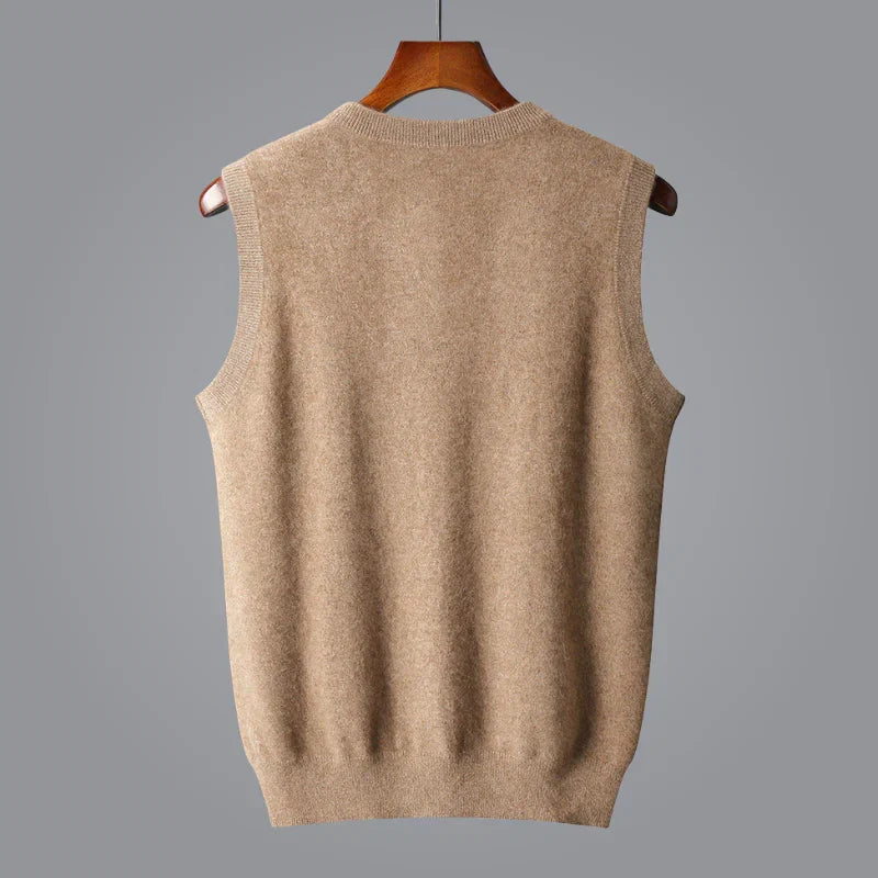 Back view of a men's beige knit sweater vest featuring a ribbed hem and sleeveless silhouette.