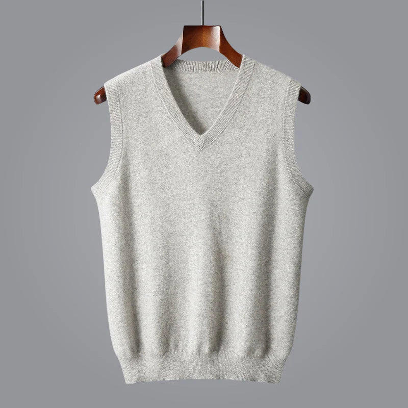Men's cream knit V-neck sweater vest with a sleeveless design and ribbed hem.