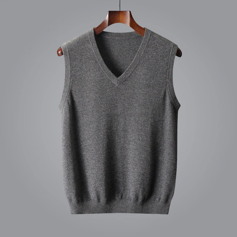 Men's charcoal gray knit V-neck sweater vest with a sleeveless silhouette and ribbed hem.