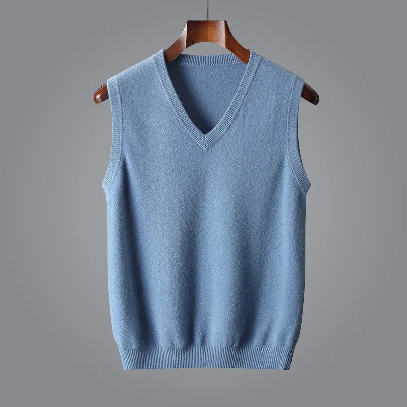 Men's light blue knit sweater vest featuring a V-neckline, sleeveless design, and ribbed trim.