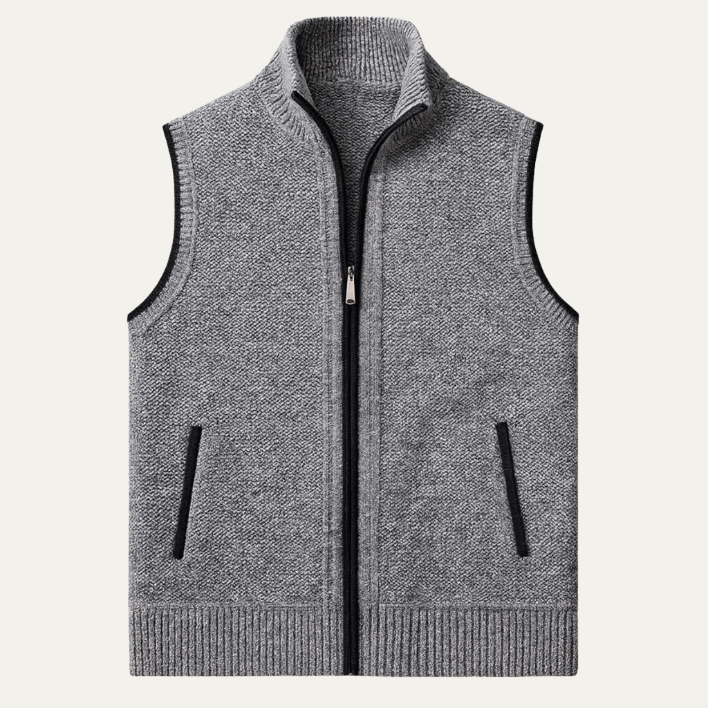 Men's light gray knit zip-up sweater vest with a stand collar, sleeveless design, ribbed hem, and front zip pockets displayed on a white background.