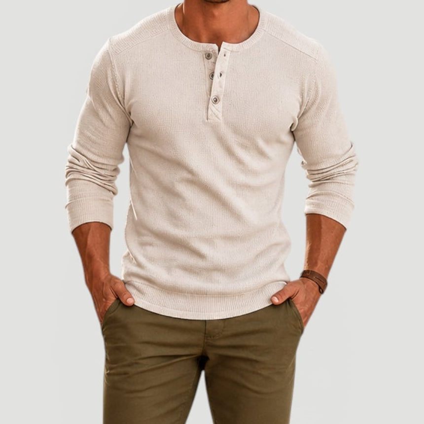 Men's cream long-sleeve Henley sweater featuring a three-button placket, crew neckline, ribbed cuffs, and a textured knit finish.