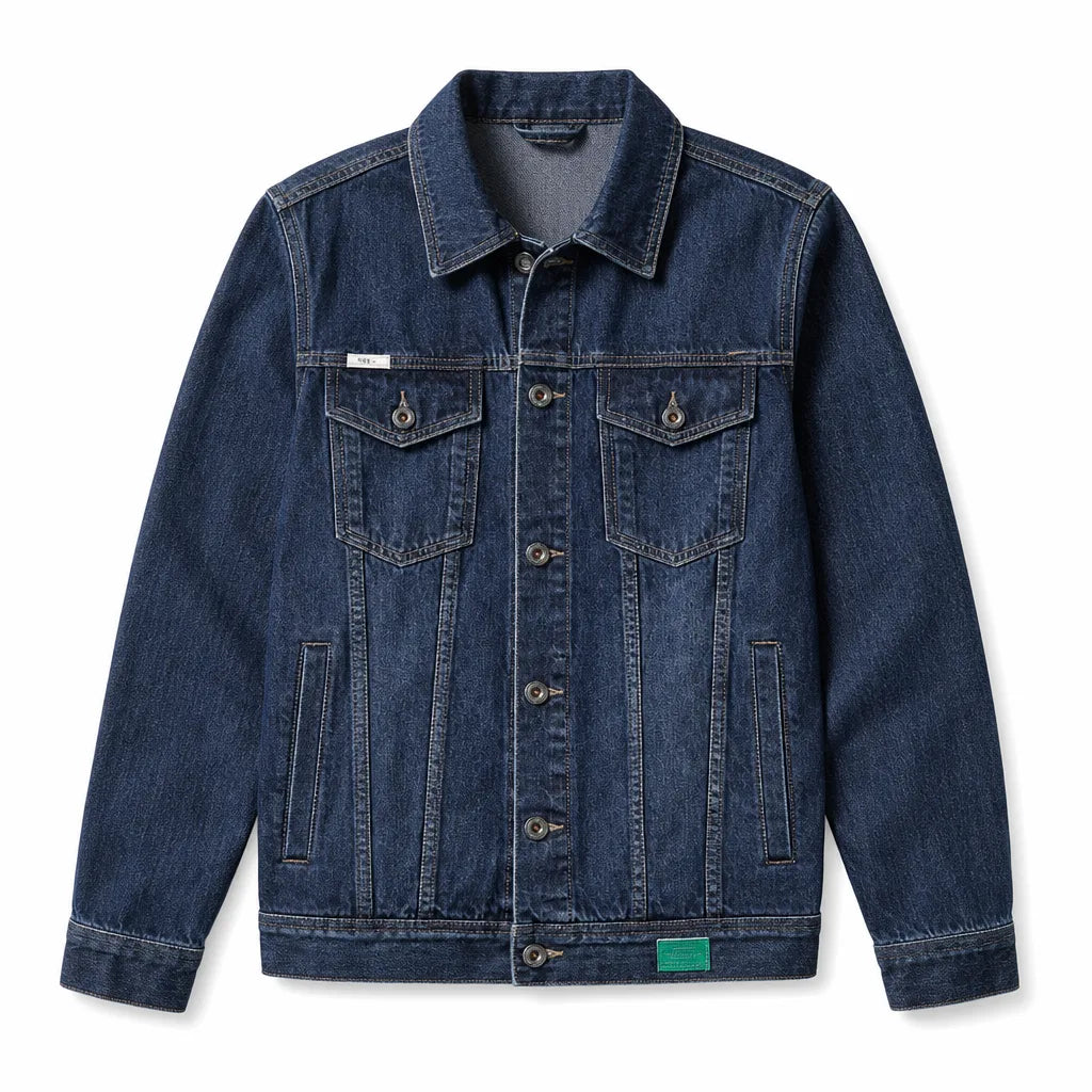Men's dark wash denim trucker jacket featuring a button-front closure, chest flap pockets, pointed collar, and contrast stitching.