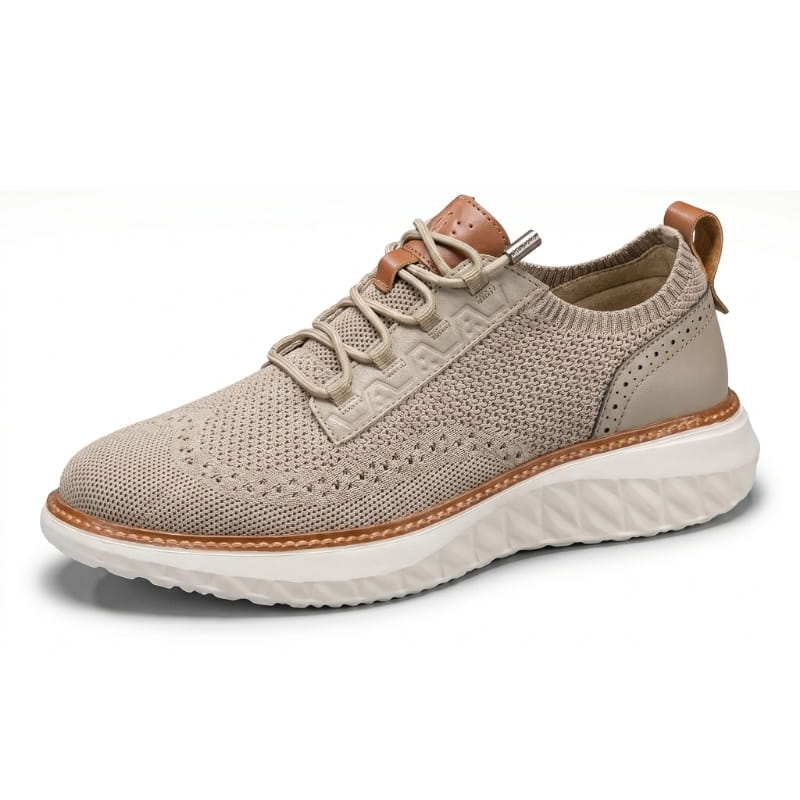 Side profile of a khaki mesh sneaker with brown leather trim and white sole on a plain white background