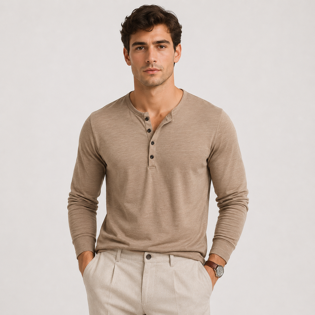 Man wearing a beige long-sleeve Henley sweater featuring a three-button neckline, ribbed cuffs, and a comfortable fit.