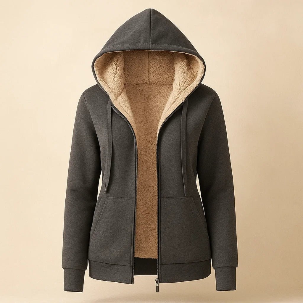 Dark gray sherpa-lined hooded jacket with a full zip closure, front pockets, long sleeves, and plush cream interior lining.