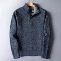 Navy blue heathered knit quarter-zip sweater with a mock neck, ribbed trim, and a plaid-lined interior.