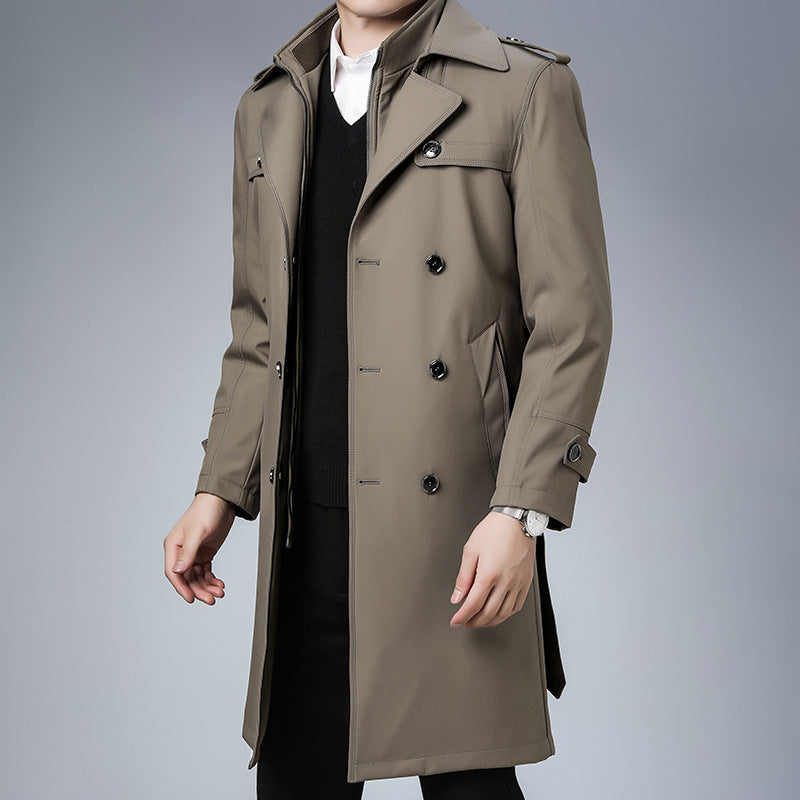 Taupe double-breasted trench coat with notch lapels, shoulder epaulettes, and a structured, water-repellent finish.