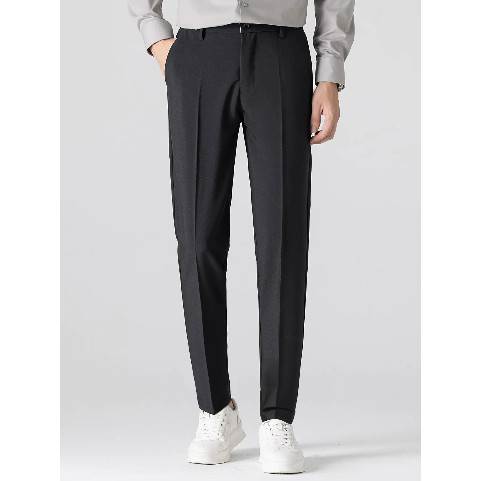 Men's black straight-leg trousers with a tailored fit displayed on a white background.