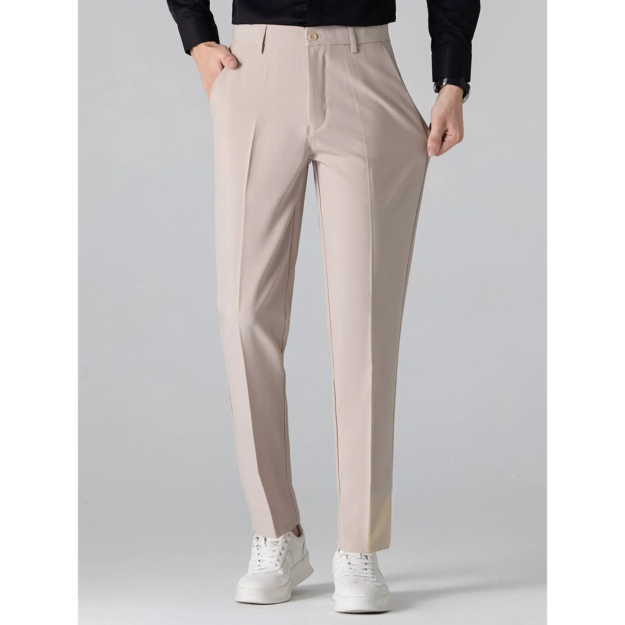 Men's beige straight-leg trousers with a tailored fit displayed on a white background.