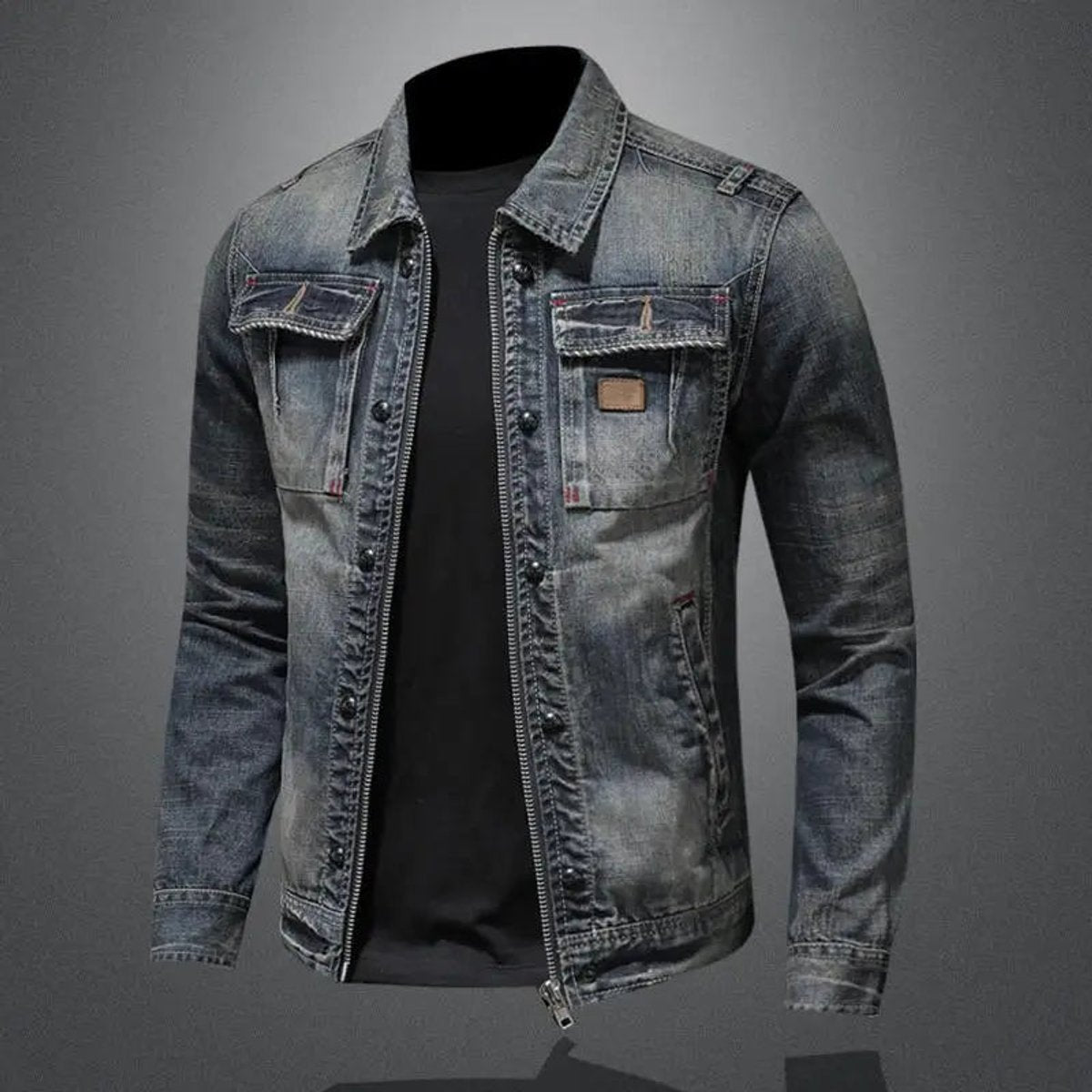 Men's vintage wash denim jacket with a button-front closure, pointed collar, chest flap pockets, and distressed faded detailing.