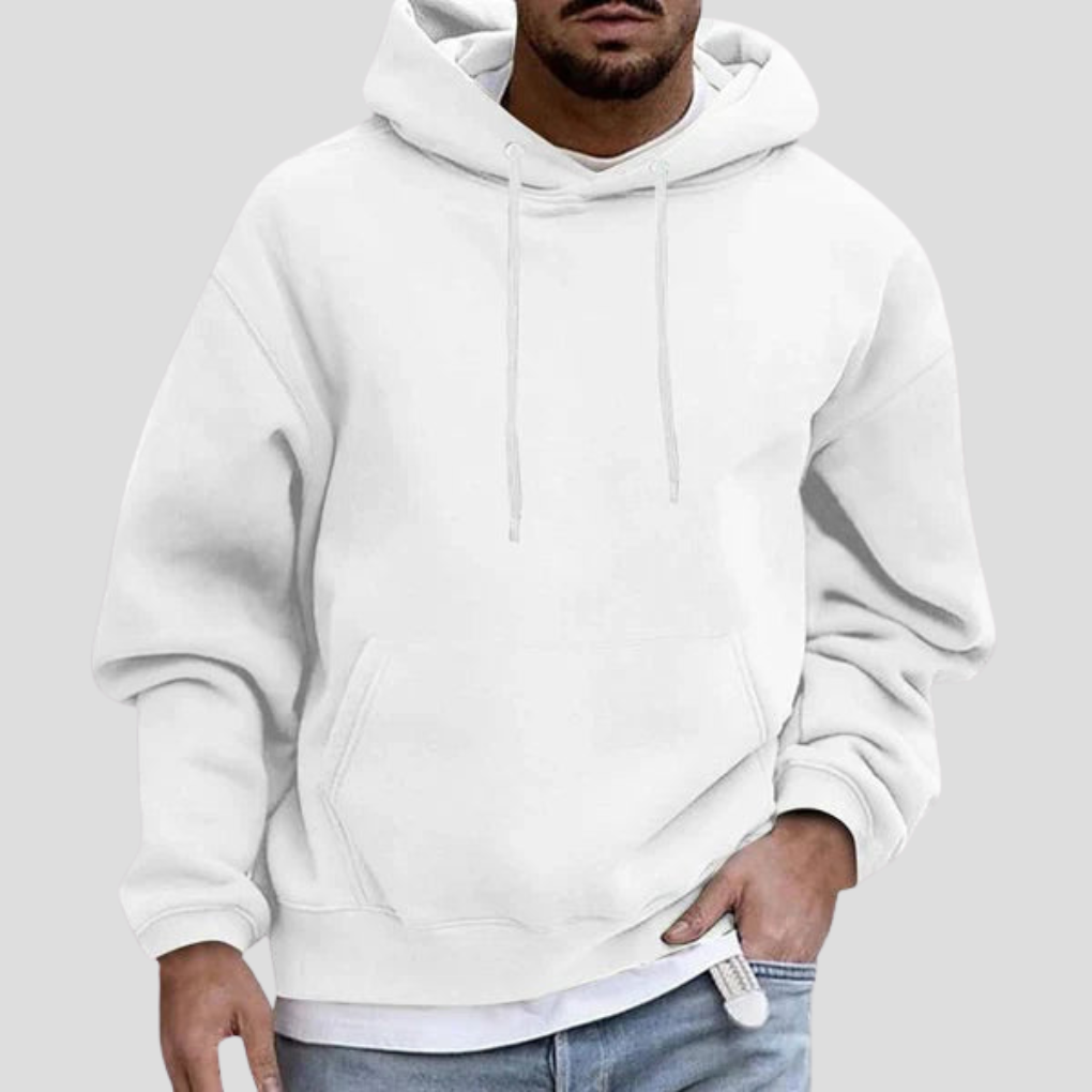 White pullover hoodie on model, close-up front view with hand in pocket