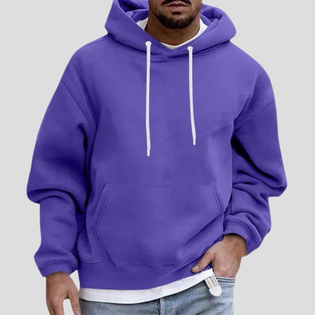 Violet pullover hoodie on model, close-up front view with hand in pocket